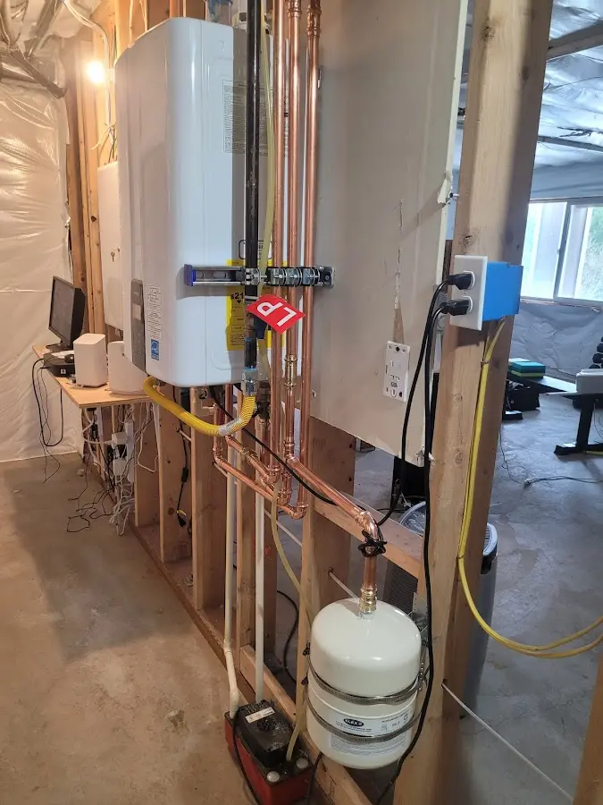 Licensed plumber repairing a kitchen sink in Kailua-Kona